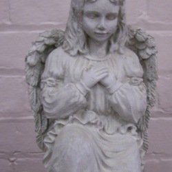 Small angel kneeling